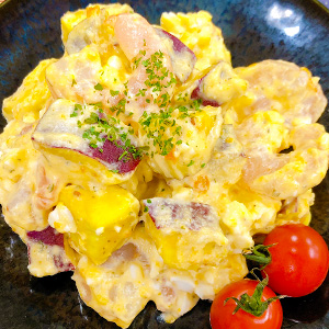 Shucked lobster and boiled egg and salad of sweet potato